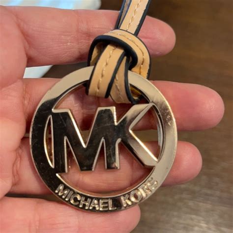 michael kors name tag|michael kors metal logo.